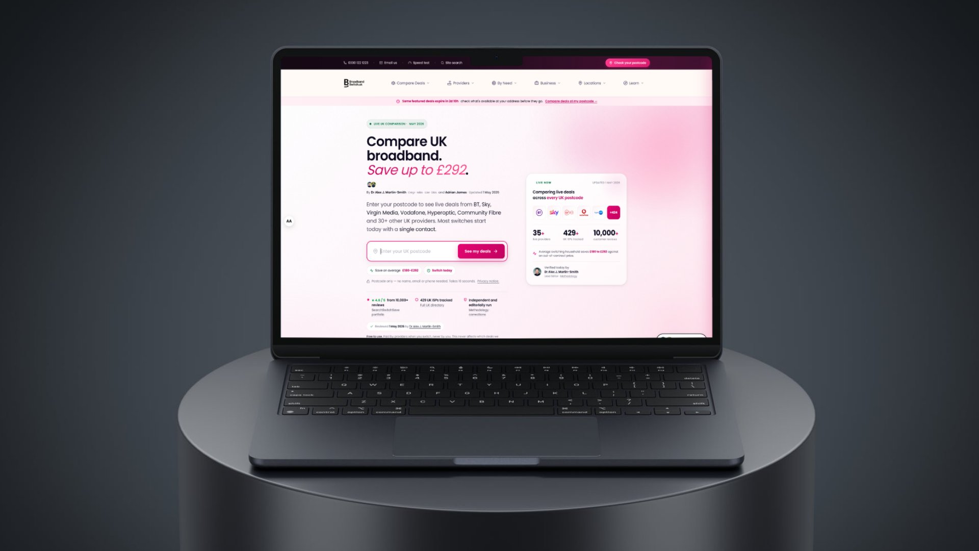 BroadbandSwitch.uk's homepage rendered on a laptop, showing the 'Compare UK broadband. Save up to £292.' headline and live deals widget