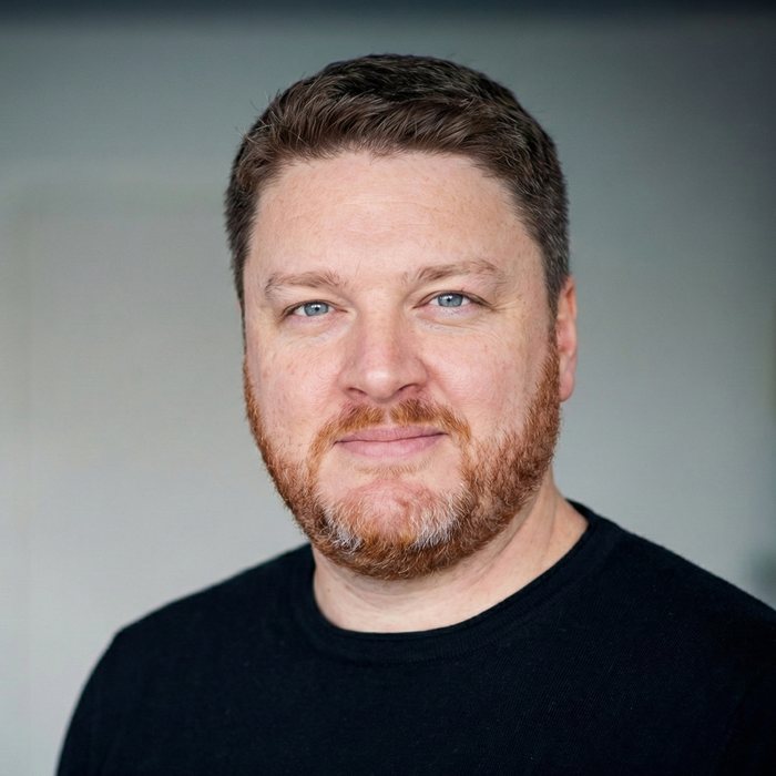 Portrait photograph of Dr Alex J. Martin-Smith.