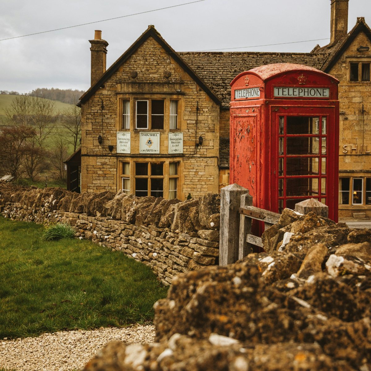 Village fixture: on duty outside the Snowshill Arms in the Cotswolds.